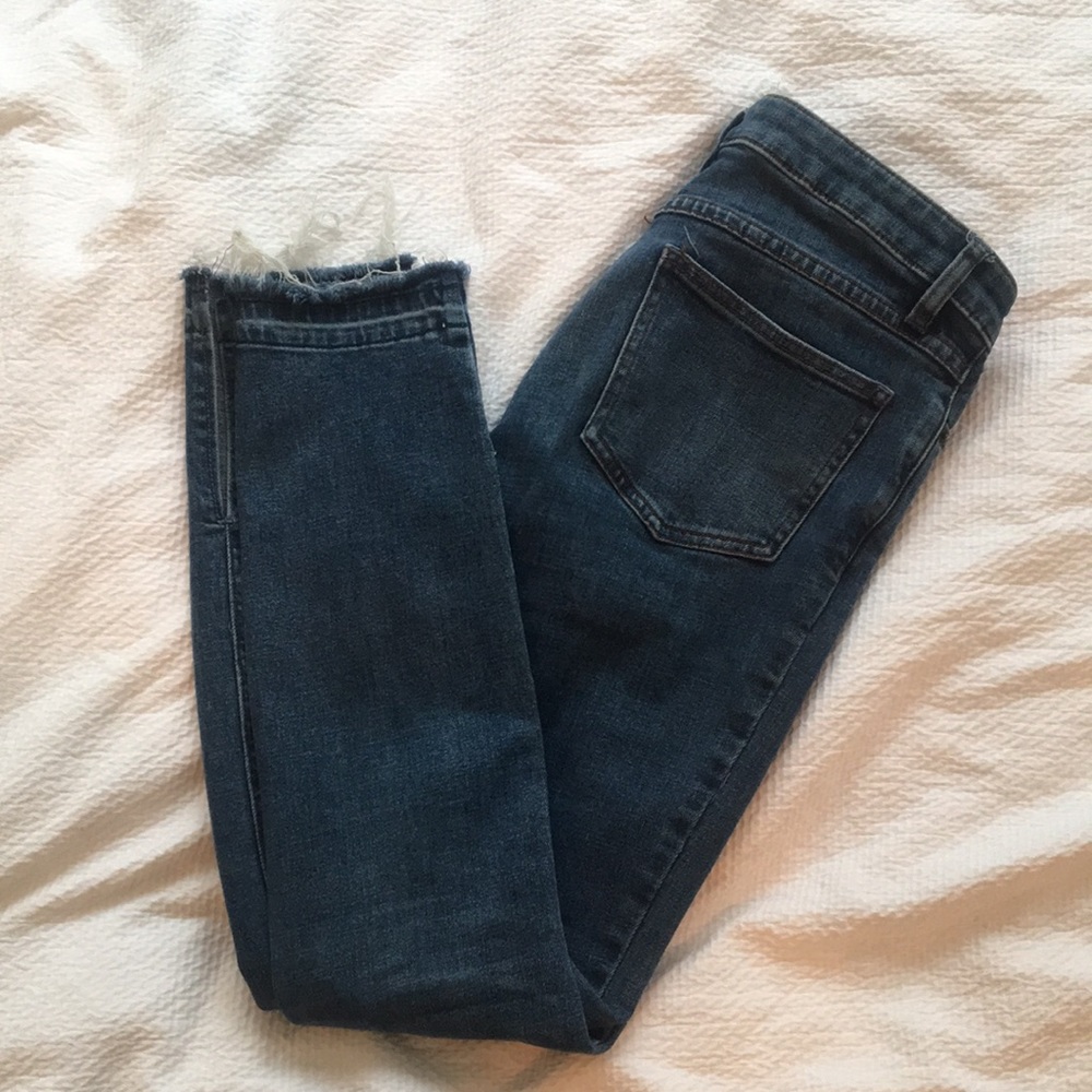 free people medium wash jeans w/ distressed bottom